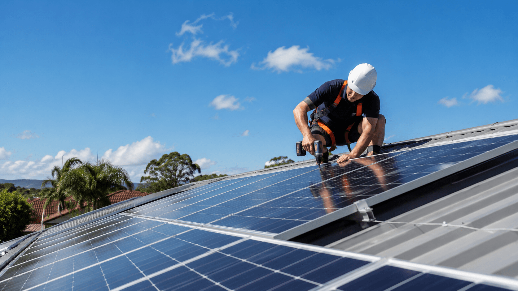 Technician installing solar panels on a rooftop