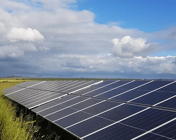 Engineer reviewing a rooftop layout for solar panel installation